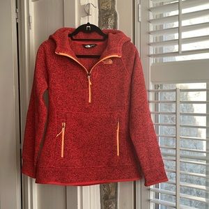 The North Face orange 1/4 zip fleece pullover w/hood and 2 front pockets.